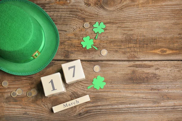 Composition for St. Patrick's Day on wooden background — Stock Photo, Image