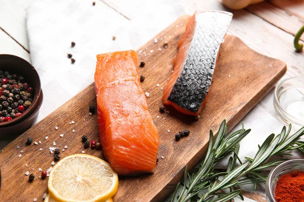 Raw salmon fillet on table — Stock Photo, Image
