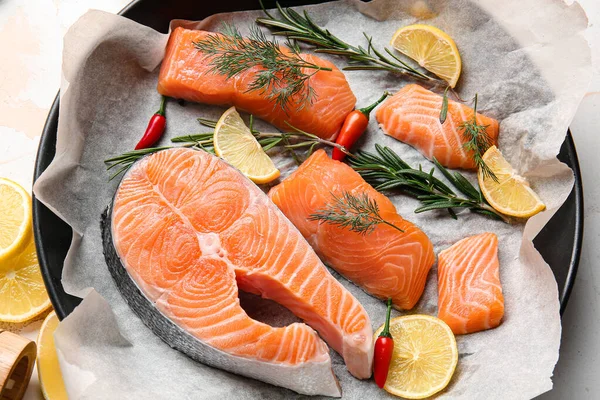 Fresh raw salmon in wok — Stock Photo, Image