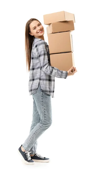Junge Frau mit Umzugskartons auf weißem Hintergrund — Stockfoto