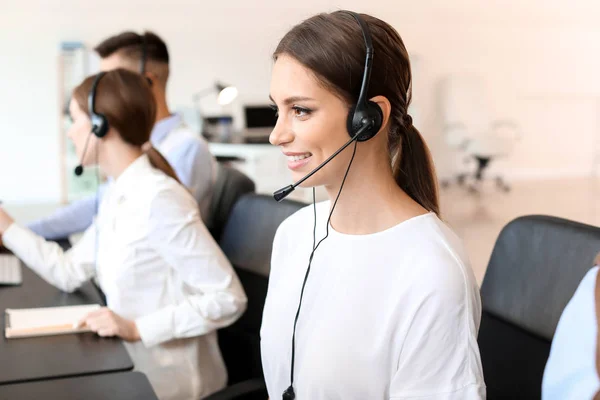 Female technical support agent working in office — Stock Photo, Image