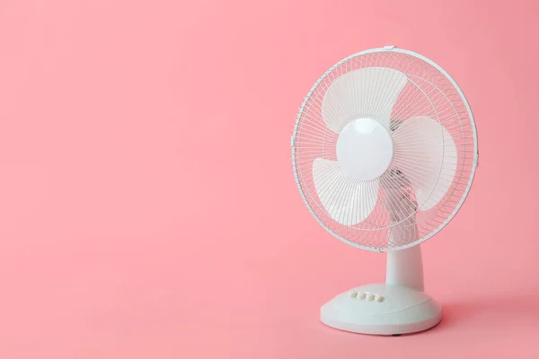 Electric fan on color background — Stock Photo, Image