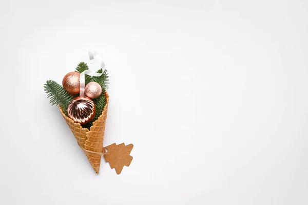 Waffle cone with Christmas decor on white background — Stock Photo, Image
