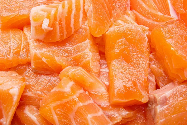 Pezzi di salmone fresco crudo come sfondo — Foto Stock