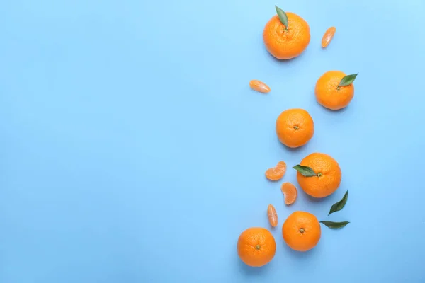 Sweet tangerines on color background — Stock Photo, Image