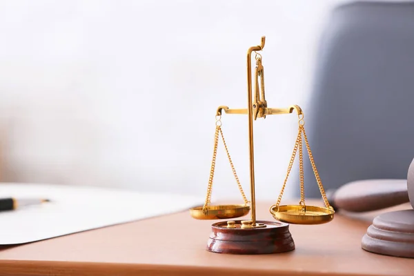 Scales of justice on lawyer's workplace — Stock Photo, Image