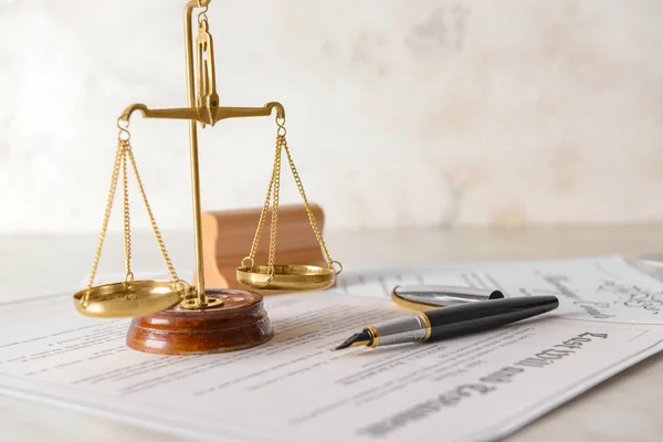 Scales of justice with documents on lawyer's workplace — Stock Photo, Image