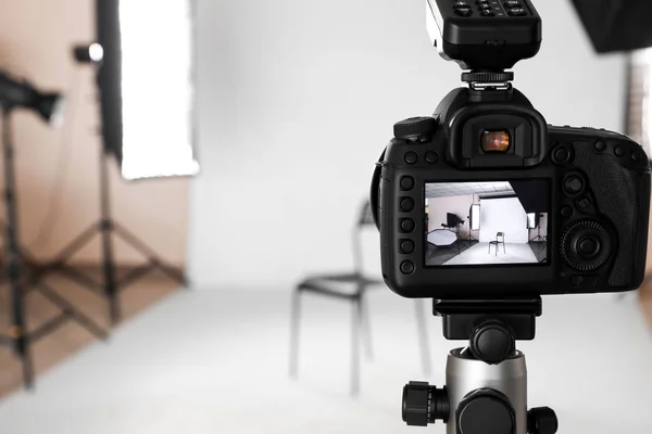 Modern photo camera in professional studio — Stock Photo, Image