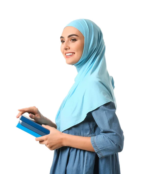 Kvinna muslimsk student på vit bakgrund — Stockfoto