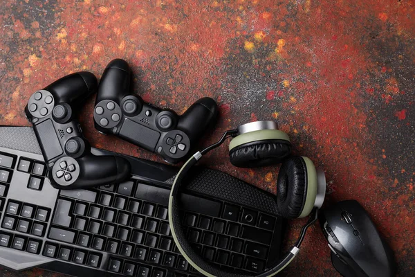 Modern gaming accessories on dark background Stock Photo by