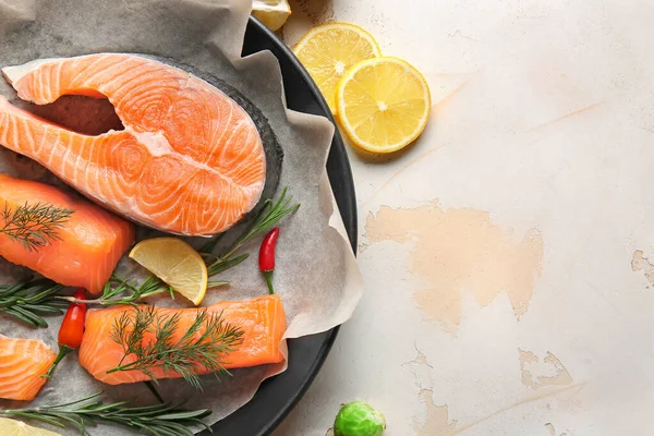 Fresh raw salmon in wok on table — Stock Photo, Image