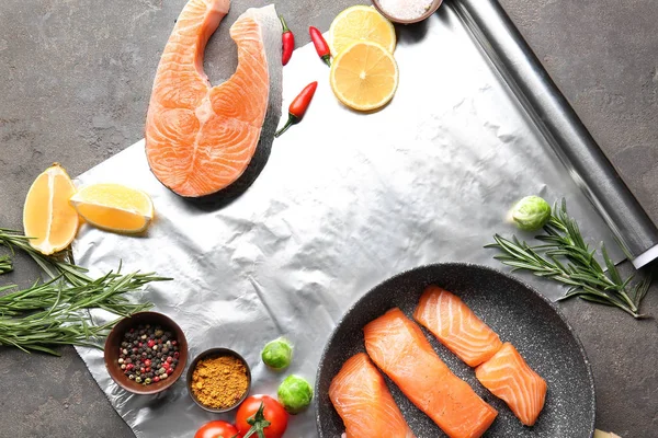 Composition with raw salmon on table — Stock Photo, Image