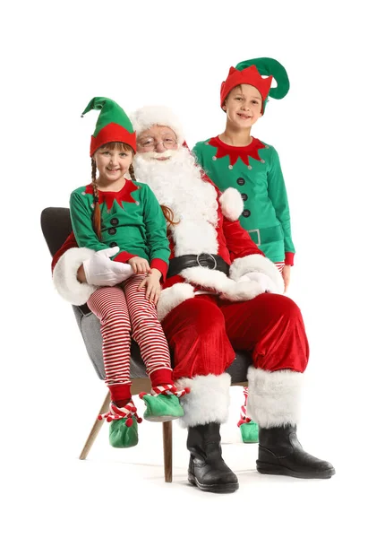 Santa Claus and little elf kids on white background — ストック写真