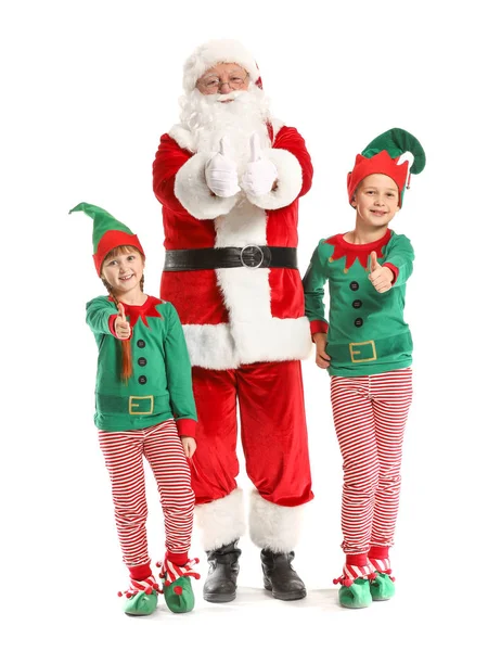 Père Noël et petits enfants elfes montrant geste pouce vers le haut sur fond blanc — Photo