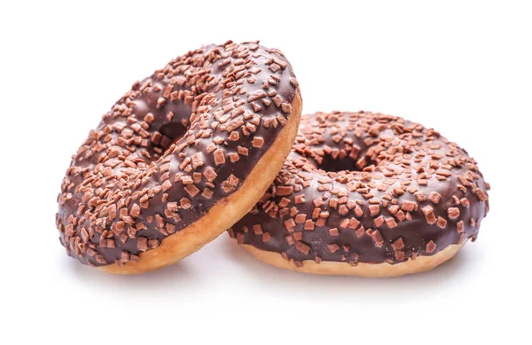 Leckere Donuts auf weißem Hintergrund — Stockfoto
