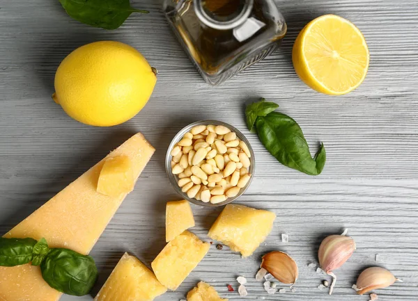Ingredients for pesto sauce on grey table — Stock Photo, Image