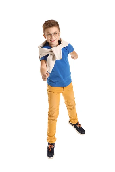 Jumping fashionable boy on white background — 스톡 사진