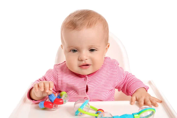 Portrait of cute little baby sitting in high-chair against white background — Stock Photo, Image