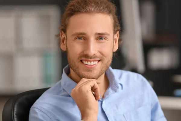 Portrait of handsome businessman in office — Stock Photo, Image