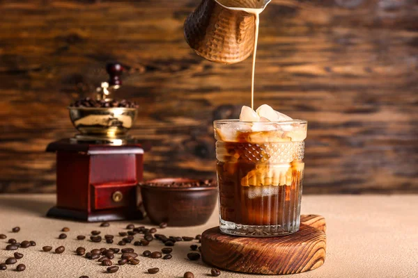 Preparing of cold coffee on table — Stock Photo, Image