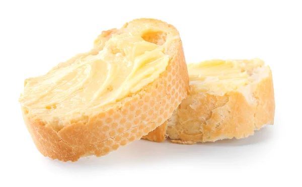 Fatias de pão com manteiga no fundo branco — Fotografia de Stock