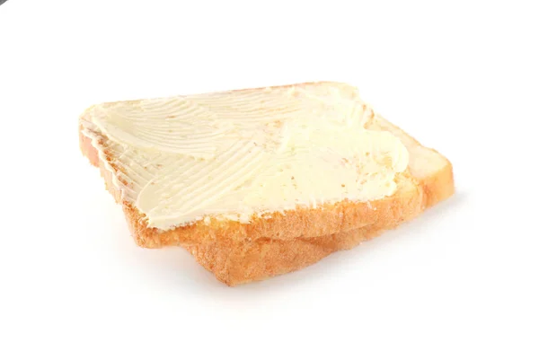 Slices of bread with butter on white background — Stock Photo, Image