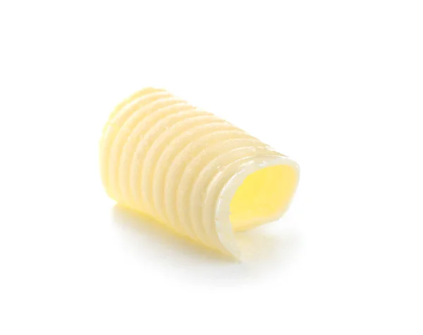 Curl von frischer Butter auf weißem Hintergrund — Stockfoto