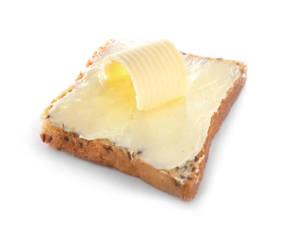 Tranche de pain avec beurre sur fond blanc — Photo