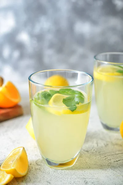 Glass of tasty lemonade on table — Stock Photo, Image