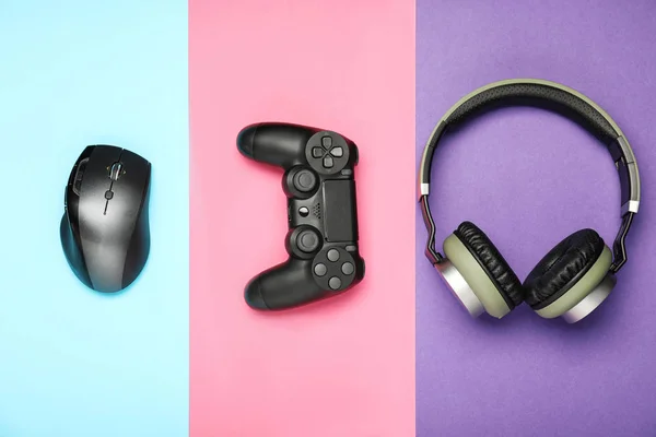 Modern gaming accessories on color background — Stock Photo, Image