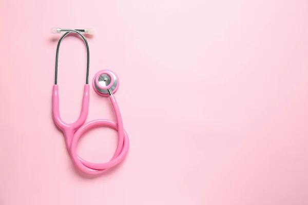 Modern stethoscope on color background — Stock Photo, Image