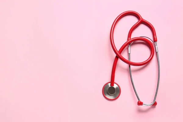 Modern stethoscope on color background — Stock Photo, Image