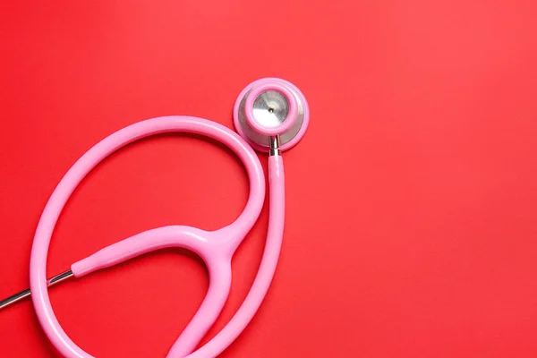 Modern stethoscope on color background — Stock Photo, Image