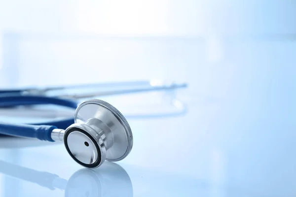 Modern stethoscope on white table, closeup — ストック写真