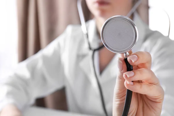 Doctor with stethoscope in clinic, closeup — Stock Photo, Image
