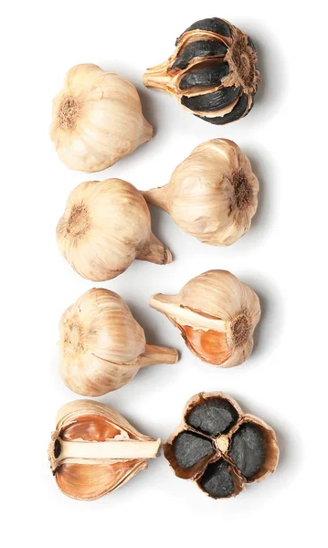 Black garlic on white background — Stock Photo, Image