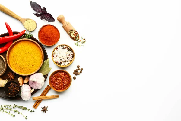 Many different spices on white background — ストック写真