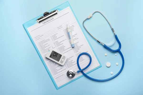 Laboratory test, stethoscope, glucometer and lancet pen on color background. Diabetes concept — Stock Photo, Image