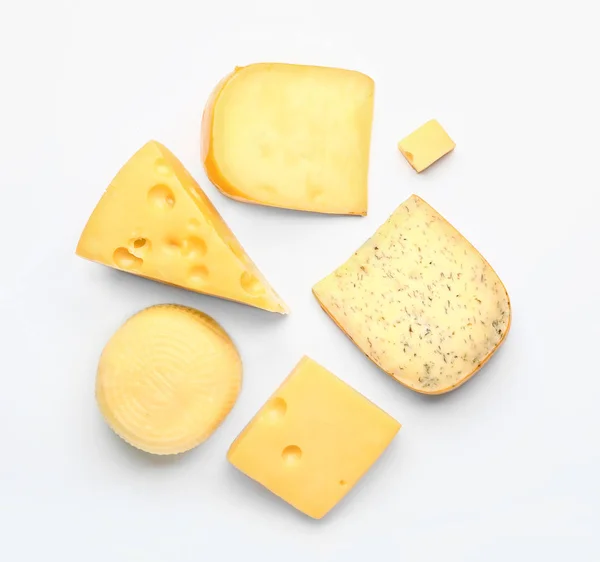 Assortment of fresh cheeses on white background — Stock Photo, Image