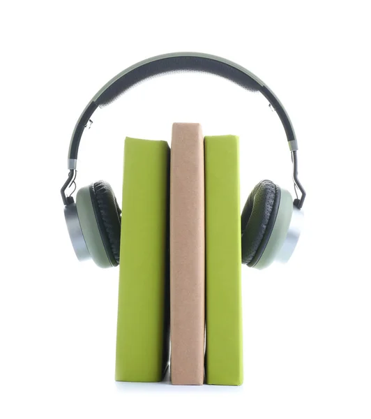 Books and modern headphones on white background. Concept of audiobook — Stock Photo, Image
