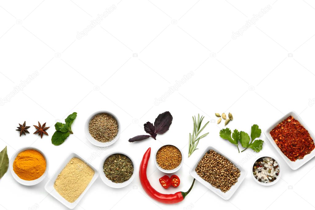 Many different spices on white background