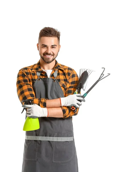 Guapo jardinero masculino con herramientas sobre fondo blanco —  Fotos de Stock