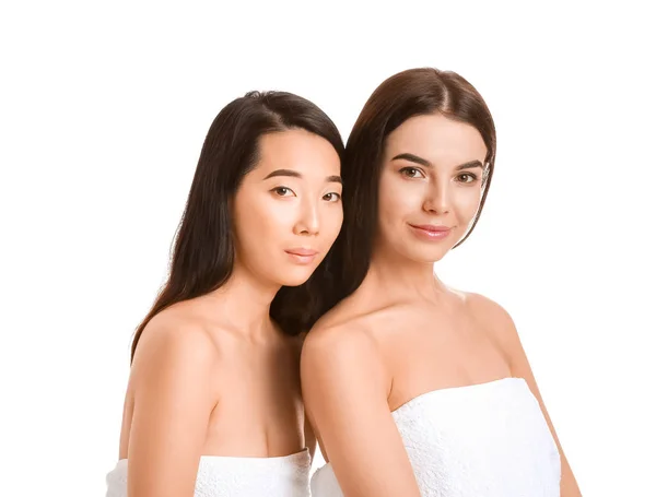 Beautiful young women with healthy skin on white background — Stock Photo, Image