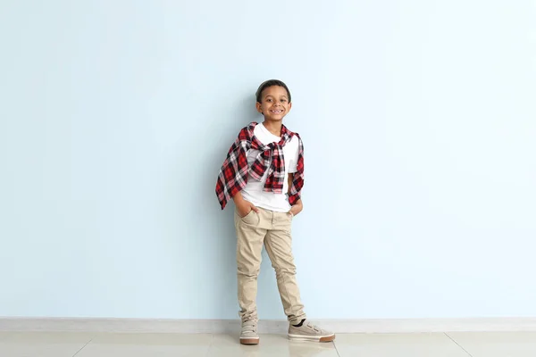 Cute fashionable African-American boy on color background — Stock Photo, Image