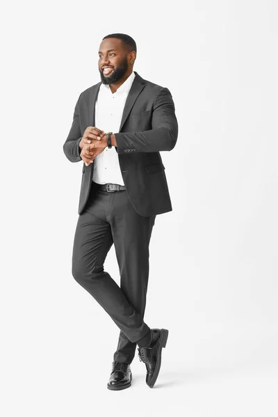 Stylish African-American man on white background — Stockfoto