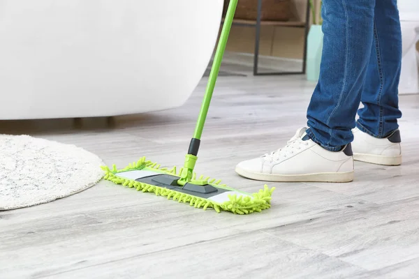 Janitor doing cleanup in bathroom, closeup — Stock Photo, Image