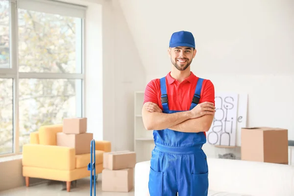 Loader in flat on moving day — Stock Photo, Image