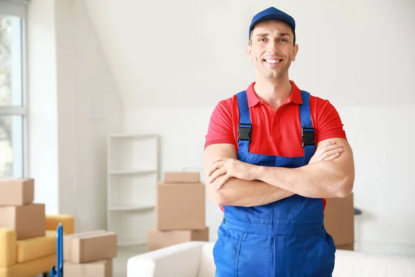 Loader in flat on moving day — Stock Photo, Image