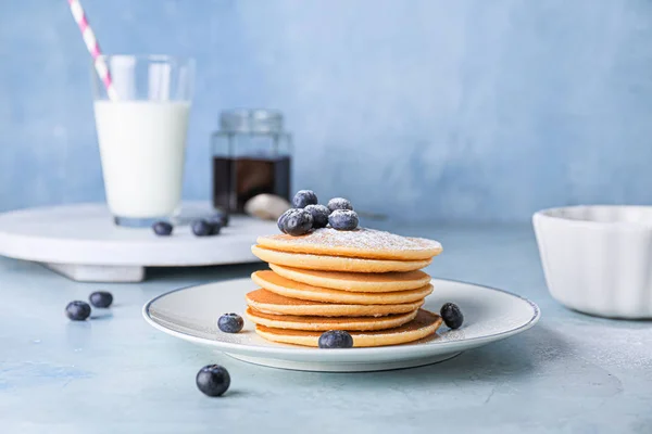 Plate with stack of tasty pancakes on table — Stock Photo, Image