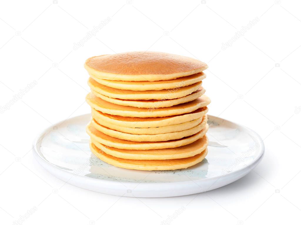 Plate with stack of tasty pancakes on white background
